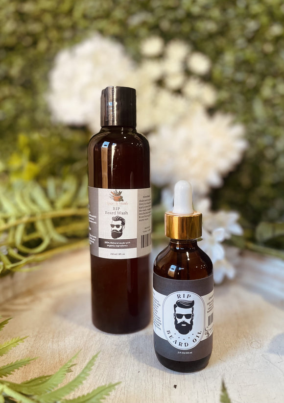 Two brown bottles with labels on a wooden surface with a blurred natural background